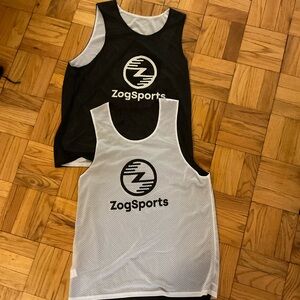 TWO Men’s Reversible Racerback Pinnies
Size L